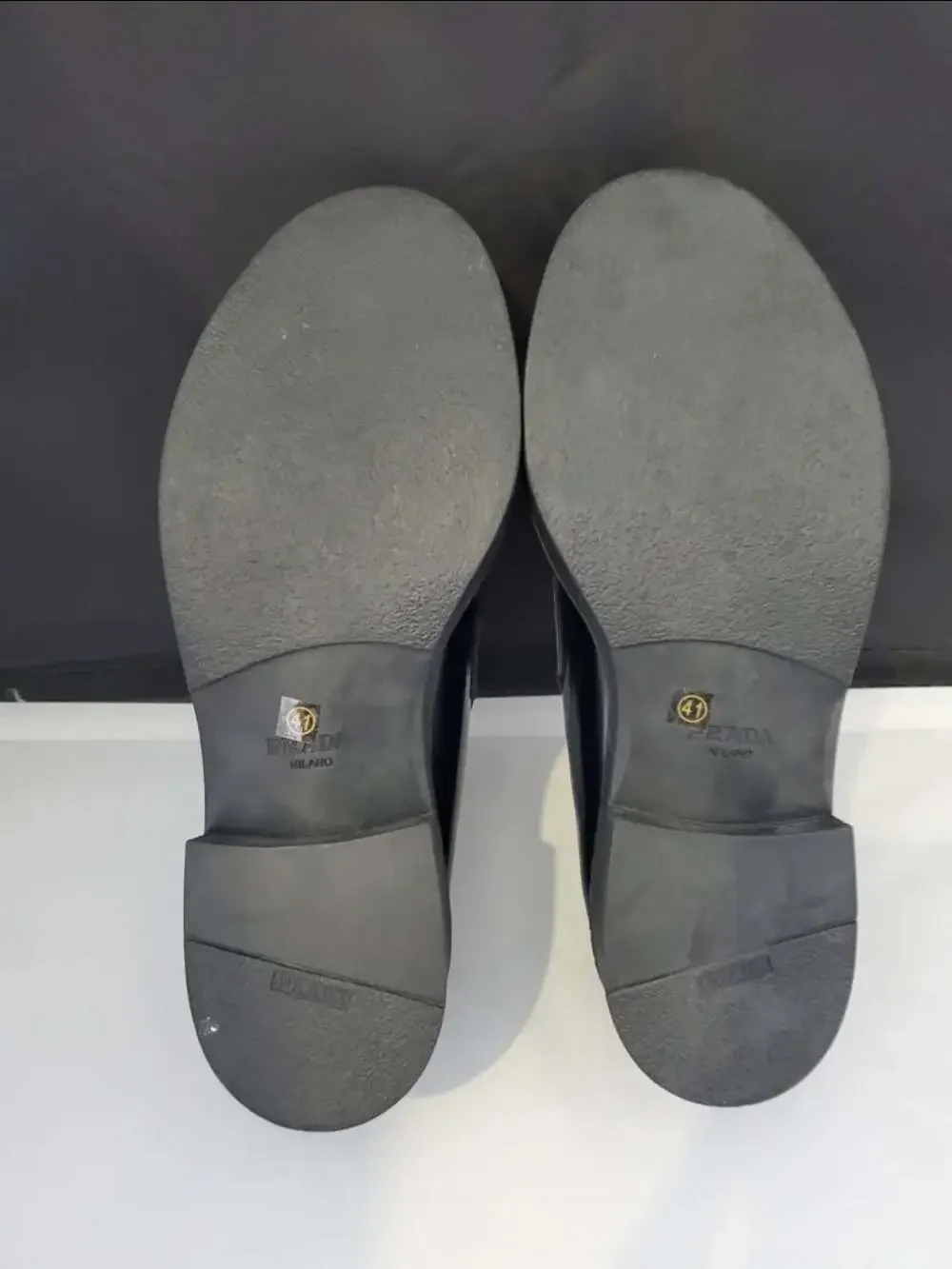 Prada Spazzolato Brushed Leather Loafers with Metal Triangle Logo